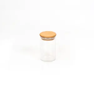 بانکه-ادویه-شیشه-ای-با-درب-چوبی-تریتی-قطر-6-ارتفاع-10-مدل-G-5003