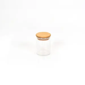 بانکه-ادویه-شیشه-ای-با-درب-چوبی-تریتی-قطر-6-ارتفاع-8-مدل-G-5002